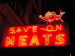 Save on meats sign