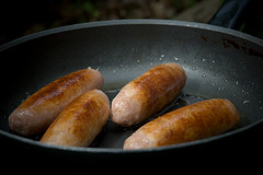 Frying sausages