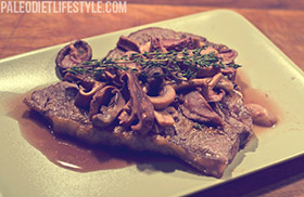 Steak with mushrooms and red wine reduction
