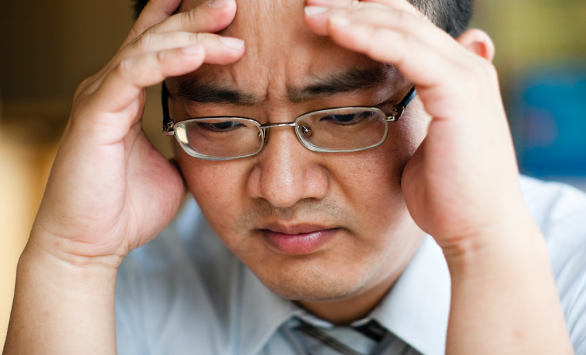 worried Asian man